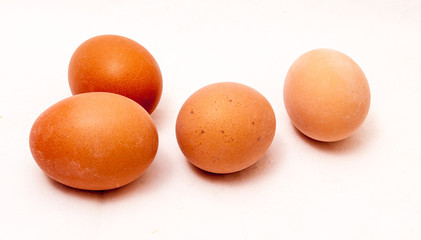 4 eggs on white background.