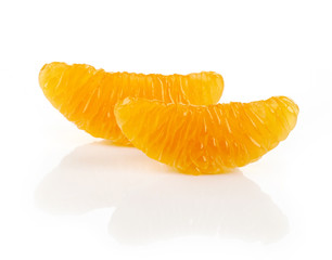 Wall Mural - Slices if fresh mandarin on white background