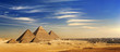 canvas print picture - Egypt. Cairo - Giza. General view of pyramids and cityscape from the Giza Plateau (on front side: 3 pyramids popularly known as Queens' Pyramids; next: the Pyramid of Mykerinos, Chephren and Cheops)