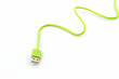 © amnach - Green USB cable for smartphone.
