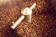 Aromatic coffee beans freshly roasted in a modern roasting machi