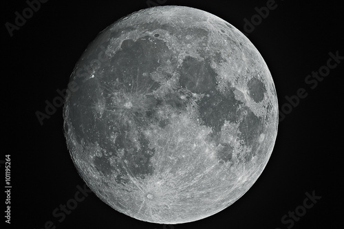 Fotografia, Obraz Growing big moon taken with telescope in black background.
