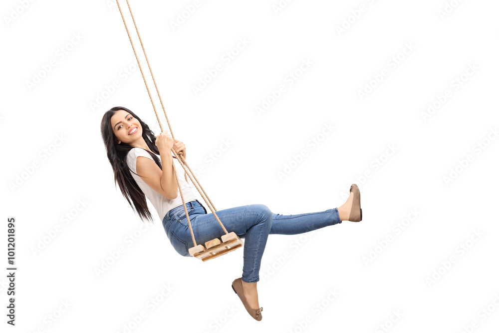 Young carefree girl swinging on a swing - obrazy, fototapety, plakaty 