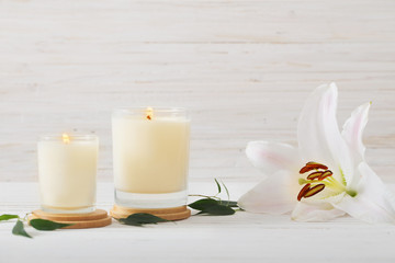 scented candles on white background