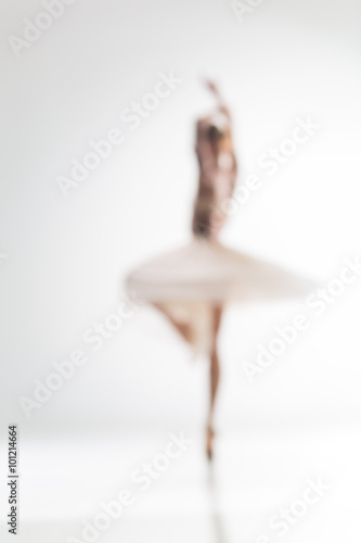 Fényképezés Blurred silhouette of ballerina on white background