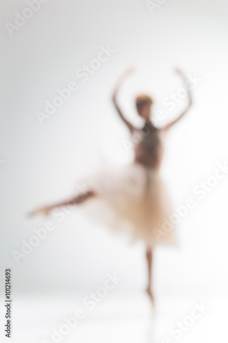 Fényképezés Blurred silhouette of ballerina on white background