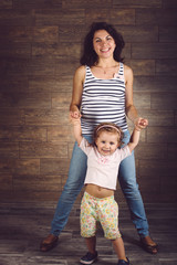 Wall Mural - Mother and Daughter Holding Hands