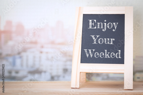 Fotografía Concept Enjoy The Weekend message on wood boards