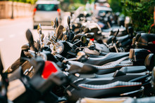 Motorbike, Motorcycle Scooters Parked In Row In City Street