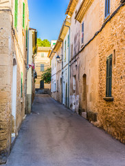 Fototapete - Idyllic view of a old village street with rustic buildings