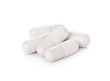 white pill capsules on white background