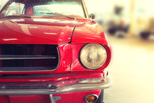 Close Up Of Front Of A Red Vintage Car