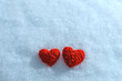 The knitting heart on a snowy background. Greeting card for Vale