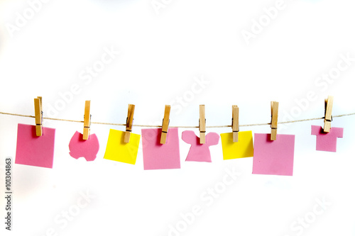 Miniature Clothesline And Wooden Clothes Pins Holding Different