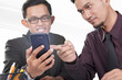 © pepscostudio - Businessmen and modern gadget