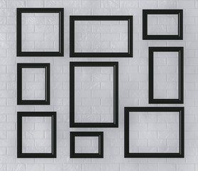Poster - Black Picture Frames on a Brick Wall