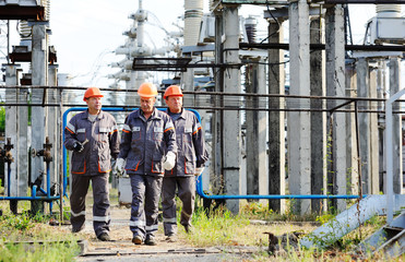 Working with a tool in the hands against the background of power