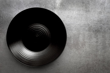 Wall Mural - Empty Round Black Plate over Slate