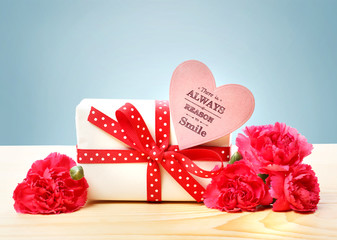 There is always a reason to smile message with gift box