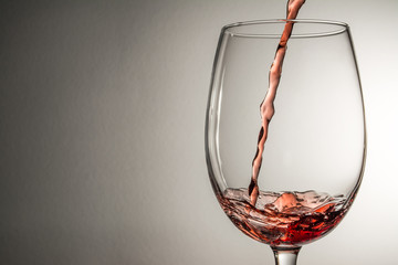 wine, splashing, splash, stream of wine being poured into a glass isolated