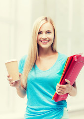 Canvas Print - smiling student with folders