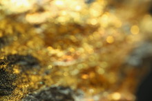 Background With Shiny Yellow Gold Ore