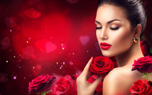 Beauty Romantic Woman With Red Rose Flowers. Valentines Day