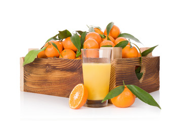 Wall Mural - Fresh ripe mandarines in wooden crate.