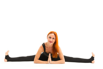 Wall Mural - Sporty young woman doing yoga asana