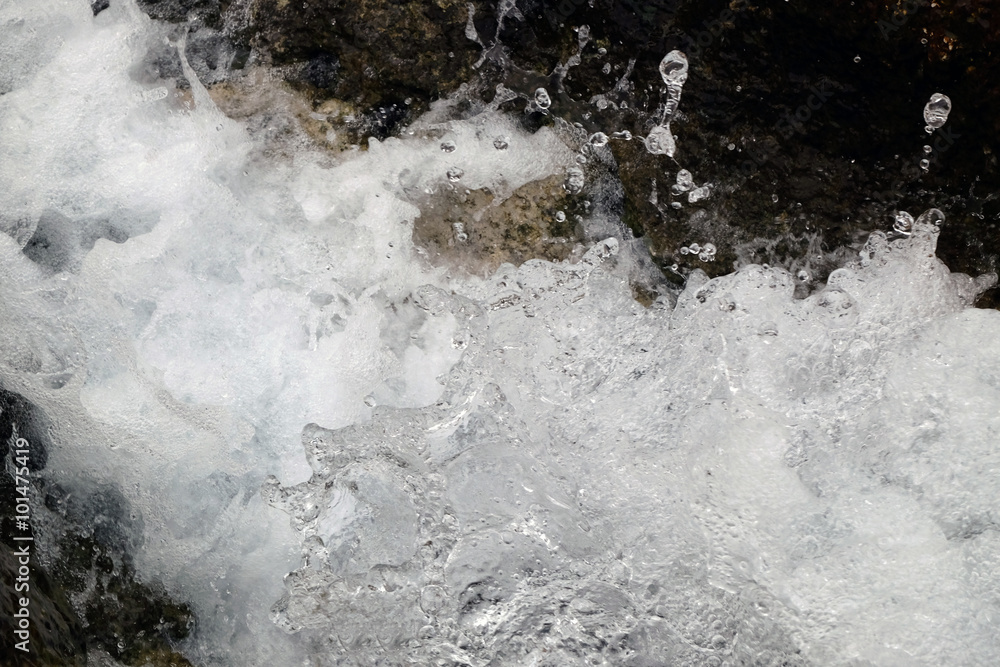 Water flowing from the stones