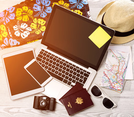 Wood tourist's desk in high definition with laptop, tablet and m