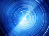 Fototapeta  - Blue glowing spin blur
