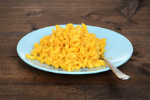 Macaroni And Cheese With Fork On Plate