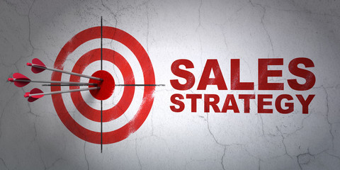 Advertising concept: target and Sales Strategy on wall background