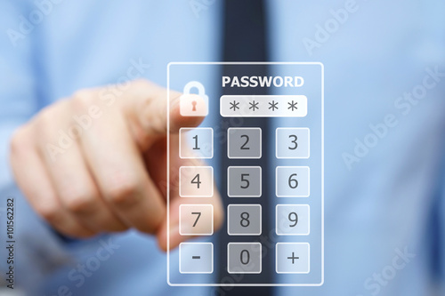 Fotografía Business man pressing security code on virtual keypad