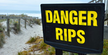 Danger Rips Of Strong Currents Sign Posted On The Beac