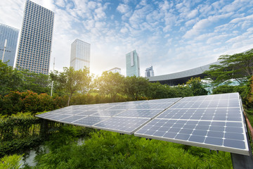 Wall Mural - solar panels in the park of modern city
