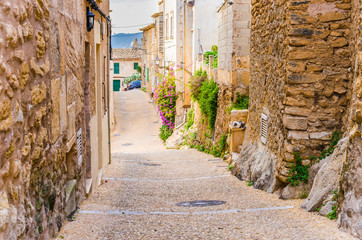 Fototapete - View of a old rustic village alleyway
