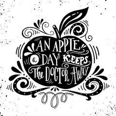 Wall Mural - An apple a day keeps the doctor away. Motivational quote about h