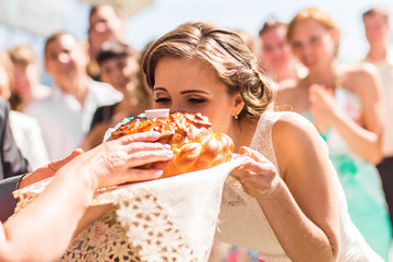 Russian wedding round loaf. Wedding bread with salt. Russian wedding ceremony