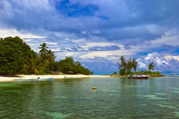 Wall Mural - Tropical island at Seychelles and boats