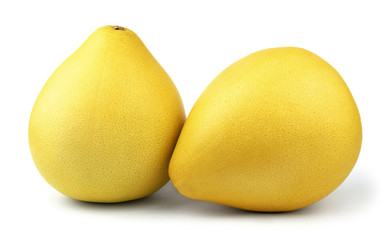 Two ripe pear-shaped yellow pomelo fruit isolated on white background. 