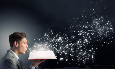 Wall Mural - Businessman with opened book