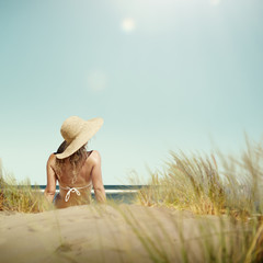 Wall Mural - Woman Sunbathe Sunny Summer Beach Relaxing Concept