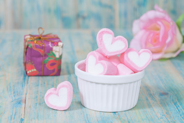 Wall Mural - Valentine candies on color wood.selective focus.