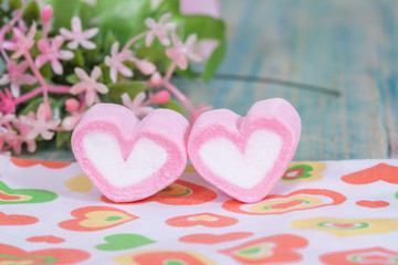 Wall Mural - Valentine candies on color wood.selective focus.