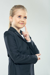 Little child girl in business style posing like adult business