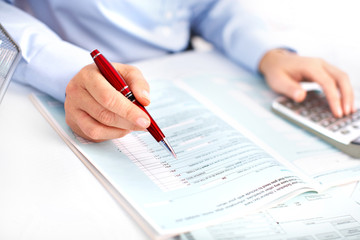 Aufkleber - Hands of accountant business woman with calculator.