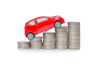 a car stand on a stack of coins