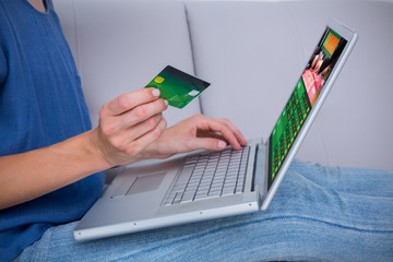 Sticker - Composite image of woman doing online shopping with laptop